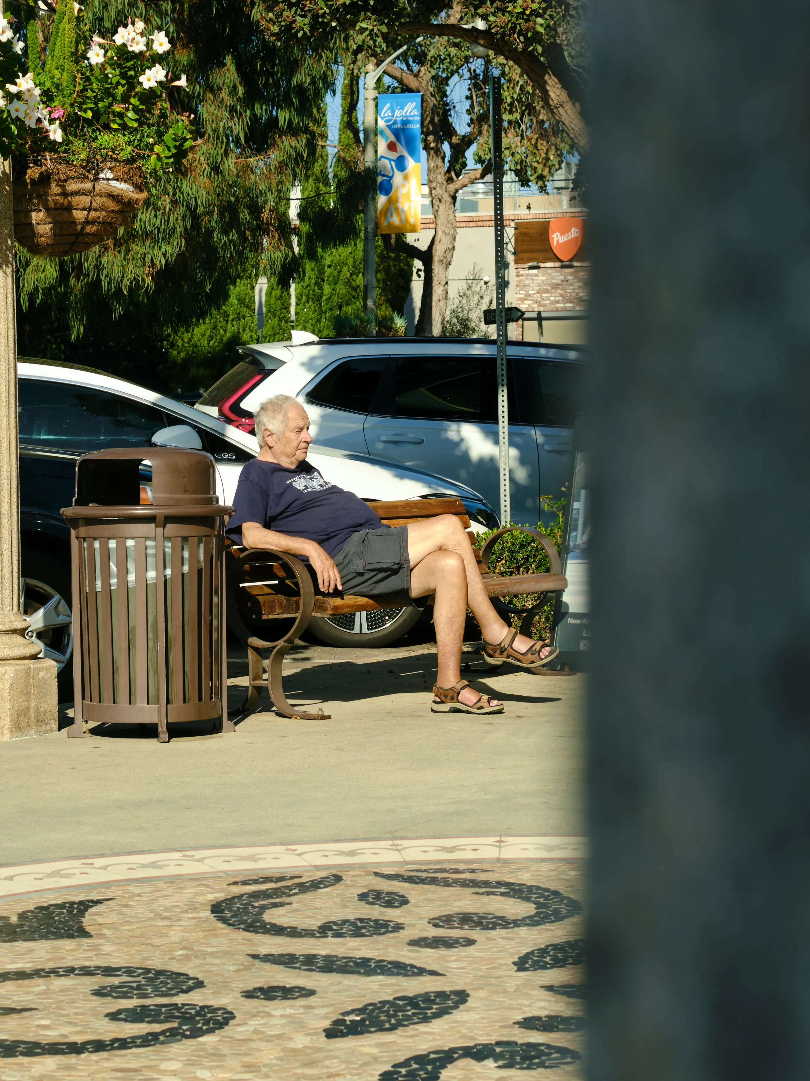 Man on a bench in the sun